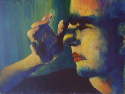 Eine Person hält sich die Hand vor die Augen.